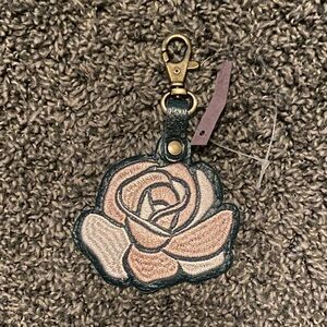 Brand new Floral Keychain with Gold Clasp with tags. The color is Rose Pink.